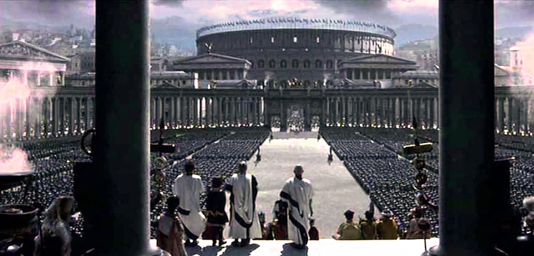 Städtereise Rom: 7 antike Sehenswürdigkeiten am Tiber-Ufer - gladiator_movie_forum Blick vom Kapitolshügel, über das Forum Romanum zum Kolosseum. Die Szene stammt aus dem Kinofilm "Gladiator" (2000).