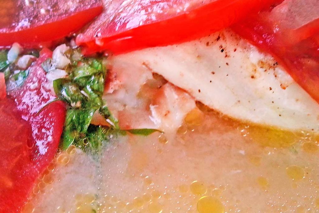 Fischfilet mit Tomaten aus dem Ofen (Glosses sto fourno)